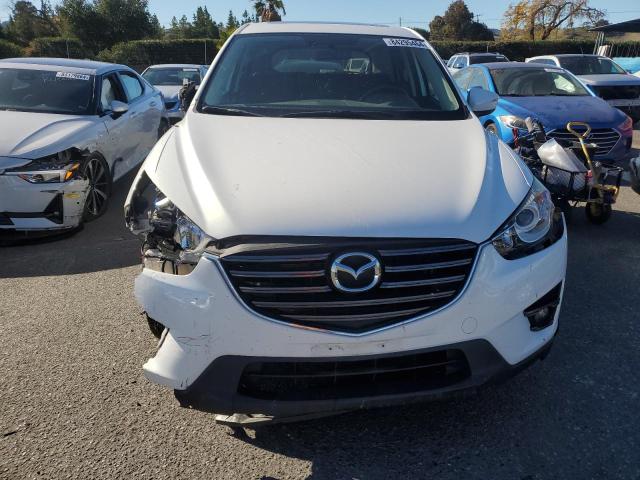 Photo 5 from auction – 2016 MAZDA CX-5 GT with VIN JM3KE2DY1G0752488