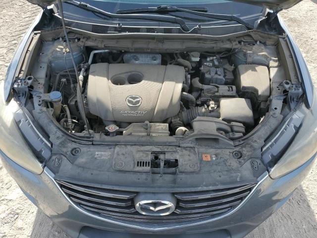 Photo 11 from auction – 2016 MAZDA CX-5 GT with VIN JM3KE2DY8G0805252
