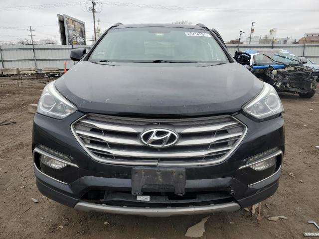 Photo 5 from auction – 2017 HYUNDAI SANTA FE S with VIN 5NMZU3LB5HH040421