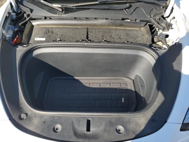Photo 11 from auction – 2023 TESLA MODEL Y with VIN 7SAYGDEE9PA073793