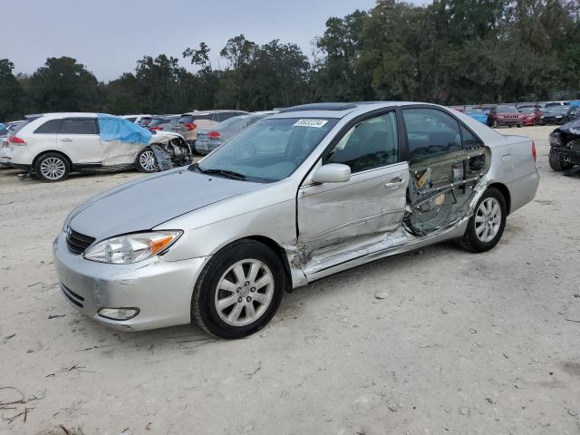 TOYOTA CAMRY LE 2004 with VIN 4T1BF30K44U071366 - Photo from auction