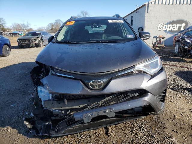 Photo 5 from auction – 2017 TOYOTA RAV4 LE with VIN JTMBFREV4HJ131356