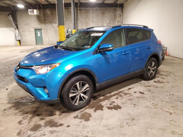 TOYOTA RAV4 XLE 2017 with VIN JTMRFREVXHD209720 - Photo from auction