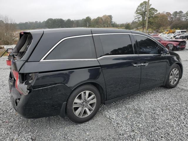Photo 3 from auction – 2014 HONDA ODYSSEY TO with VIN 5FNRL5H90EB019669