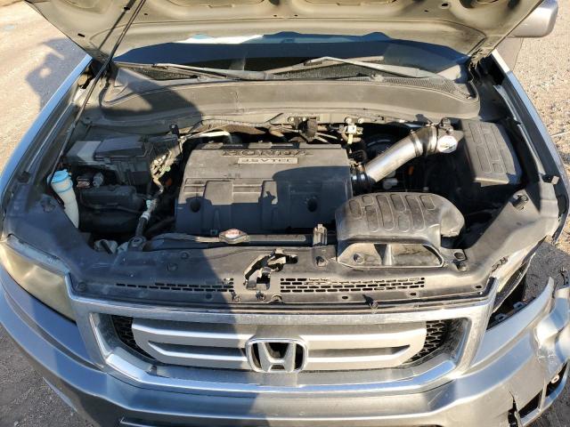 Photo 11 from auction – 2009 HONDA RIDGELINE with VIN 5FPYK16519B106243
