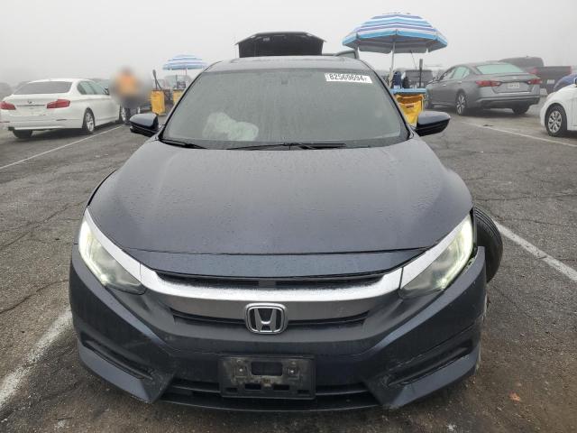 Photo 5 from auction – 2018 HONDA CIVIC EX with VIN 2HGFC2F77JH522611