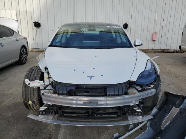 Photo 5 from auction – 2022 TESLA MODEL 3 with VIN 5YJ3E1EA5NF326052