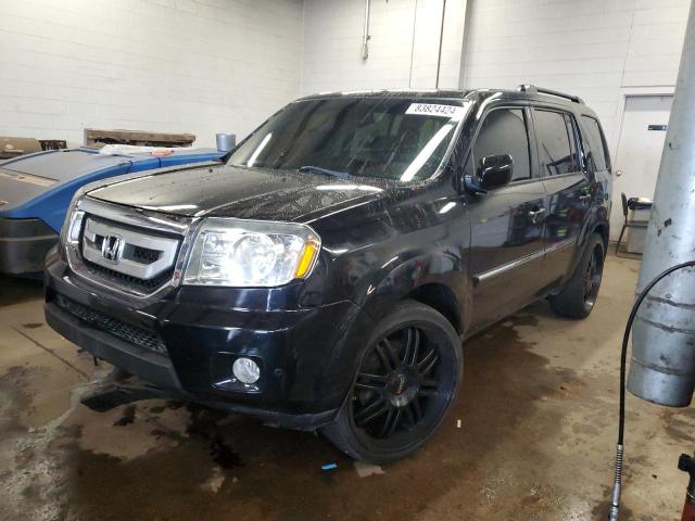 HONDA PILOT TOUR 2011 with VIN 5FNYF4H94BB089877 - Photo from auction