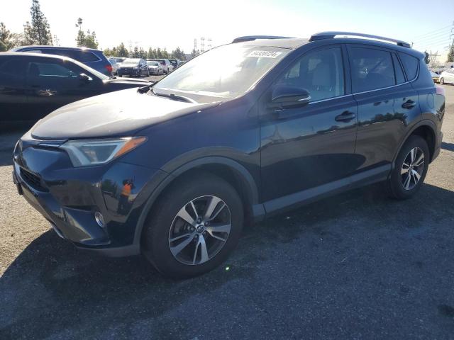 Photo 1 from auction – 2017 TOYOTA RAV4 XLE with VIN JTMWFREV7HD103129