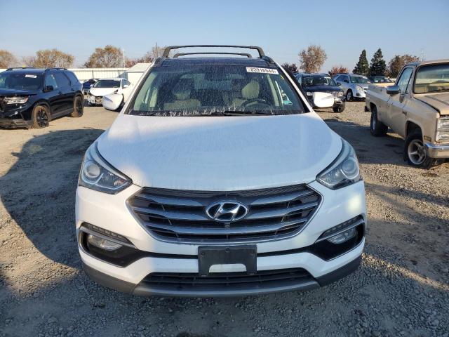 Photo 5 from auction – 2018 HYUNDAI SANTA FE S with VIN 5NMZU3LB8JH067425