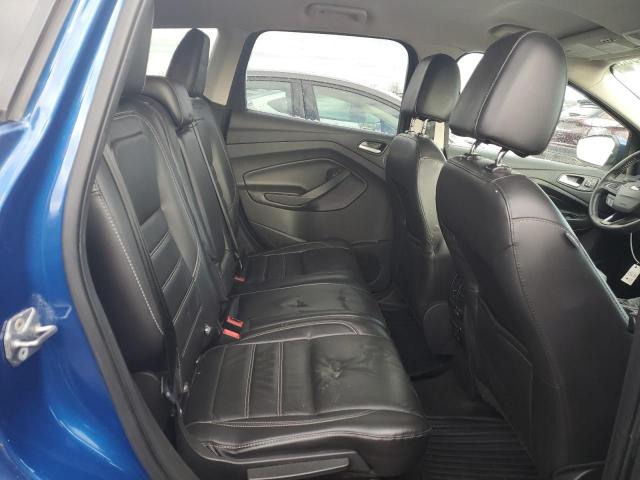 Photo 11 from auction – 2017 FORD ESCAPE TIT with VIN 1FMCU0J97HUF09954