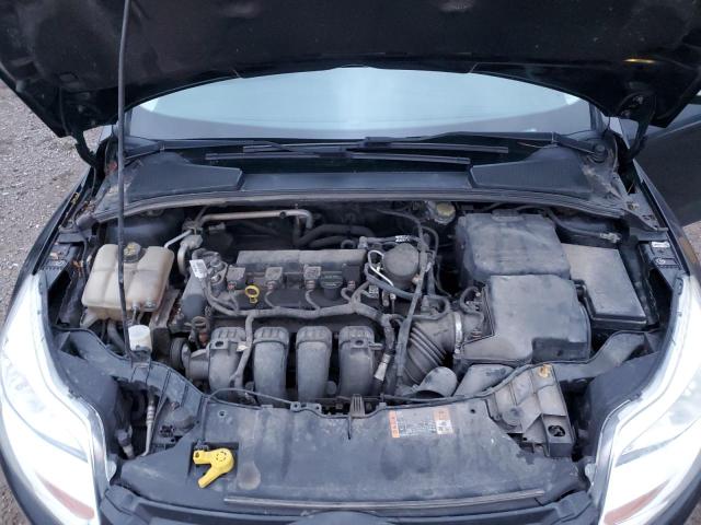 Foto 11 de la subasta – 2014 FORD FOCUS SE con VIN 1FADP3K22EL328240