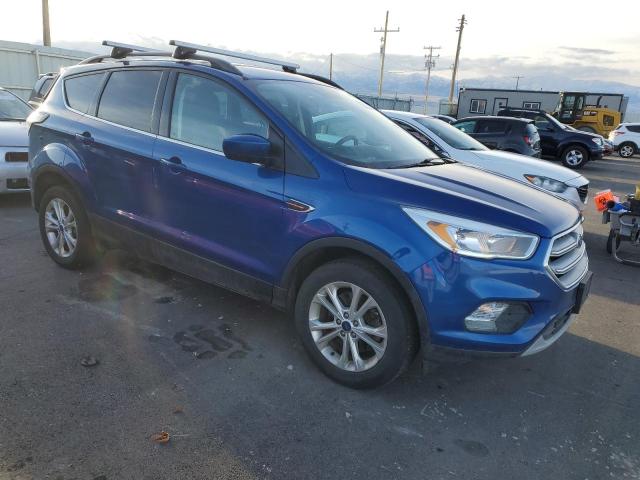 Photo 4 from auction – 2018 FORD ESCAPE SE with VIN 1FMCU9GD1JUA47140