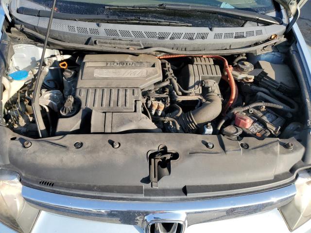 Photo 11 from auction – 2006 HONDA CIVIC HYBR with VIN JHMFA36276S007024