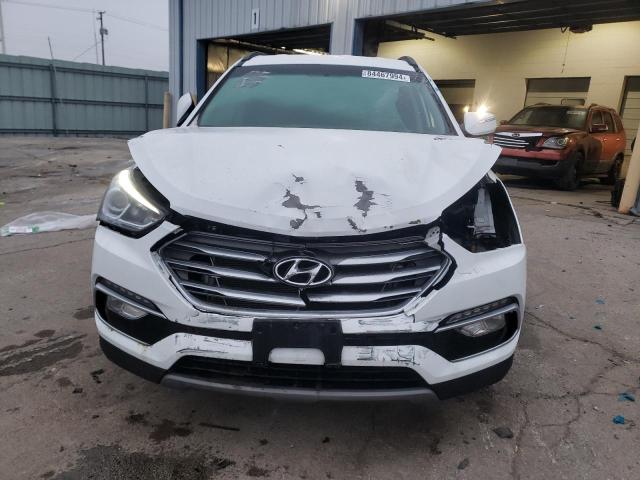 Photo 5 from auction – 2018 HYUNDAI SANTA FE S with VIN 5NMZU3LB2JH097147