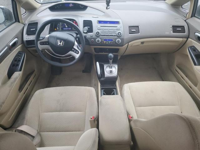 Photo 8 from auction – 2006 HONDA CIVIC HYBR with VIN JHMFA36236S025312