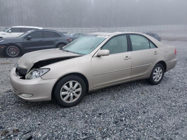 TOYOTA CAMRY LE 2003 with VIN 4T1BF32K03U047805 - Photo from auction