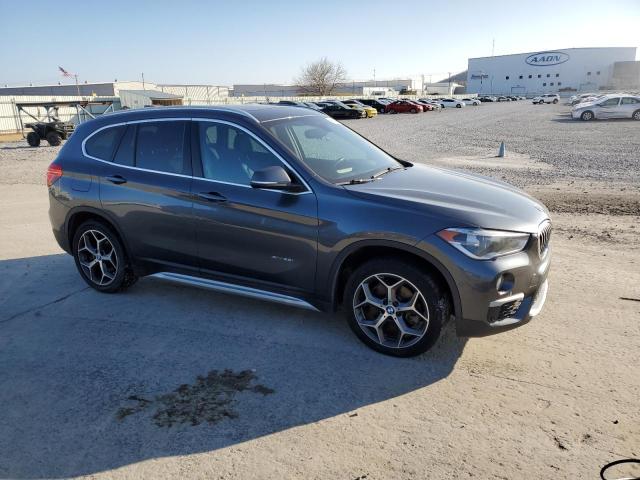 Photo 4 from auction – 2018 BMW X1 XDRIVE2 with VIN WBXHT3C34J5F88030