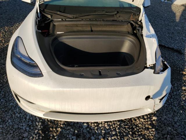 Photo 11 from auction – 2023 TESLA MODEL Y with VIN 7SAYGDEE0PA030525