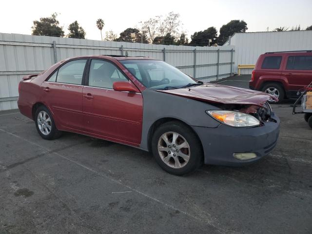 Photo 4 from auction – 2004 TOYOTA CAMRY LE with VIN JTDBE30K640268070