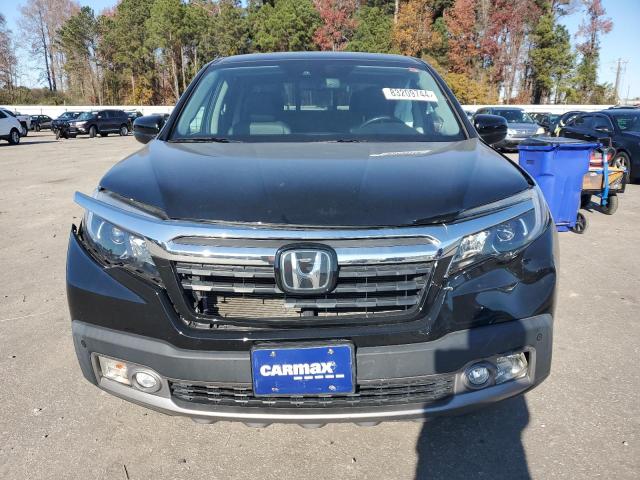 Photo 5 from auction – 2020 HONDA RIDGELINE with VIN 5FPYK3F72LB015339