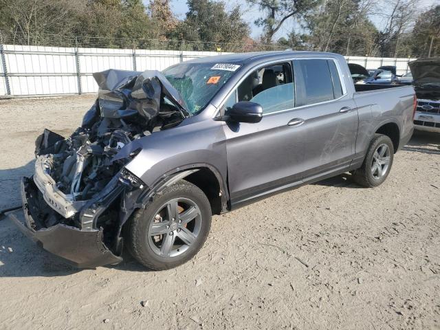 Photo 1 from auction – 2023 HONDA RIDGELINE with VIN 5FPYK3F59PB023510
