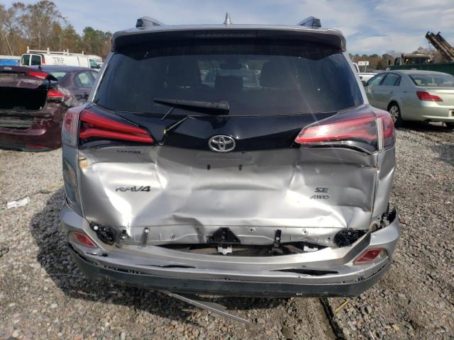 Photo 6 from auction – 2018 TOYOTA RAV4 SE with VIN JTMJFREV2JJ209926