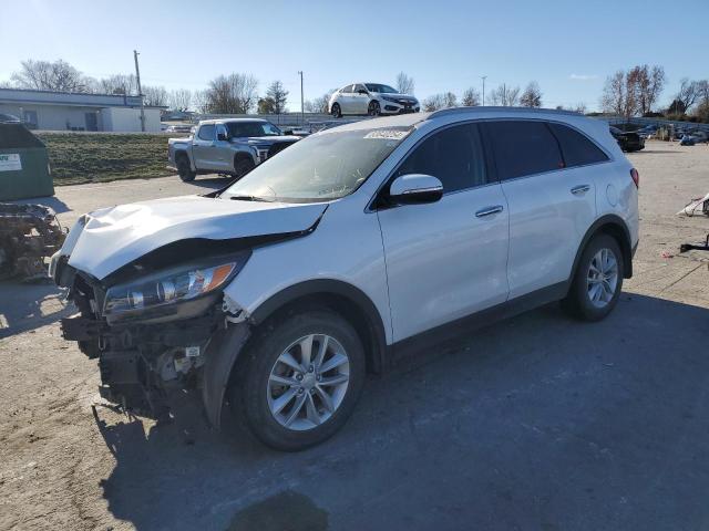 KIA SORENTO LX 2016 with VIN 5XYPG4A32GG030423 - Photo from auction