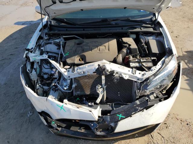 Photo 11 from auction – 2018 TOYOTA COROLLA L with VIN 5YFBURHE0JP794409