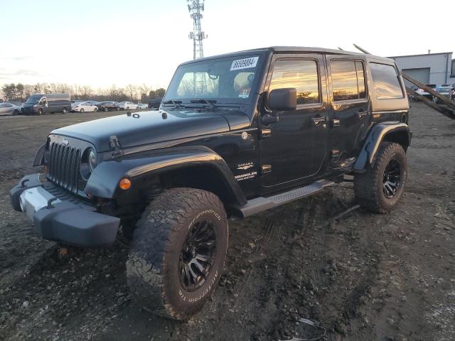 JEEP WRANGLER U 2011 with VIN 1J4HA5H13BL617480 - Photo from auction