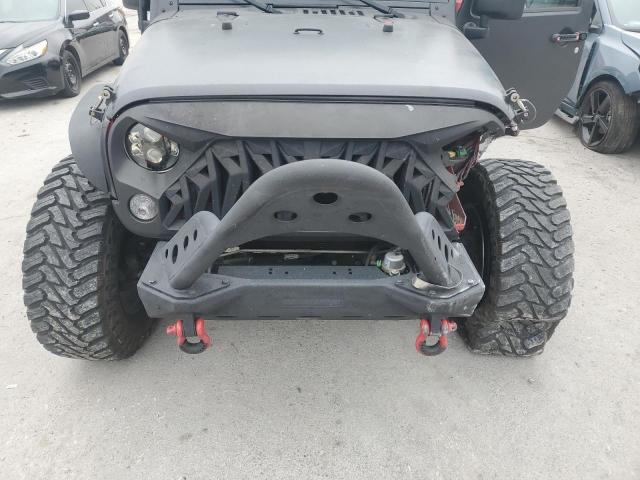 Photo 11 from auction – 2014 JEEP WRANGLER U with VIN 1C4BJWDGXEL156679
