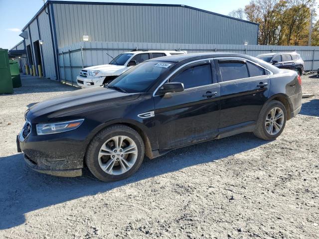 FORD TAURUS SEL 2017 with VIN 1FAHP2E81HG129219 - Photo from auction