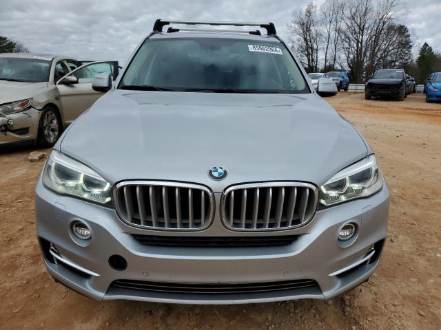 Photo 5 from auction – 2014 BMW X5 XDRIVE5 with VIN 5UXKR6C57E0J72430