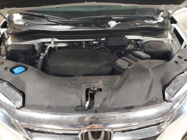 Photo 12 from auction – 2021 HONDA PILOT EXL with VIN 5FNYF6H57MB078044