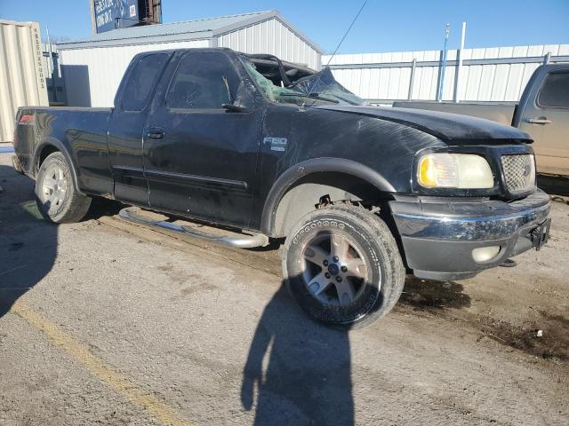 Photo 4 from auction – 2002 FORD F150 with VIN 1FTRX18WX2NB60409