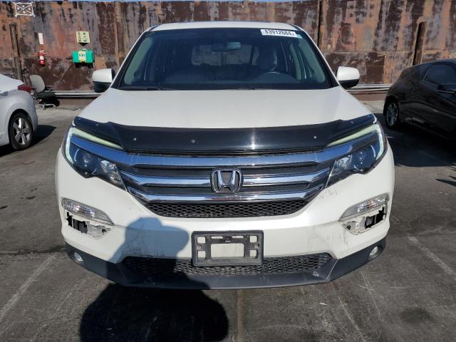 Photo 5 from auction – 2018 HONDA PILOT EXL with VIN 5FNYF6H55JB068950