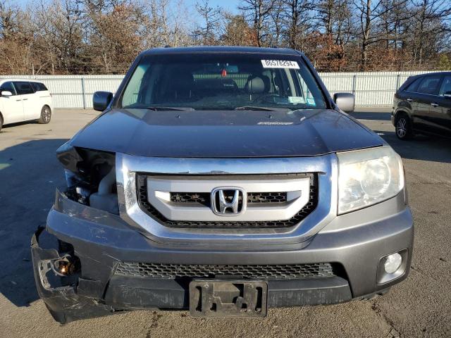 Photo 5 from auction – 2011 HONDA PILOT EXLN with VIN 5FNYF4H79BB035652