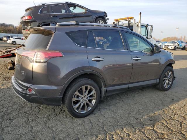 Photo 3 from auction – 2018 TOYOTA RAV4 LIMIT with VIN JTMDFREV6JJ233594