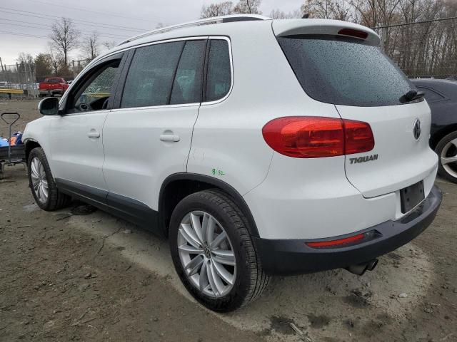 Photo 2 from auction – 2014 VOLKSWAGEN TIGUAN S with VIN WVGAV3AX3EW577348