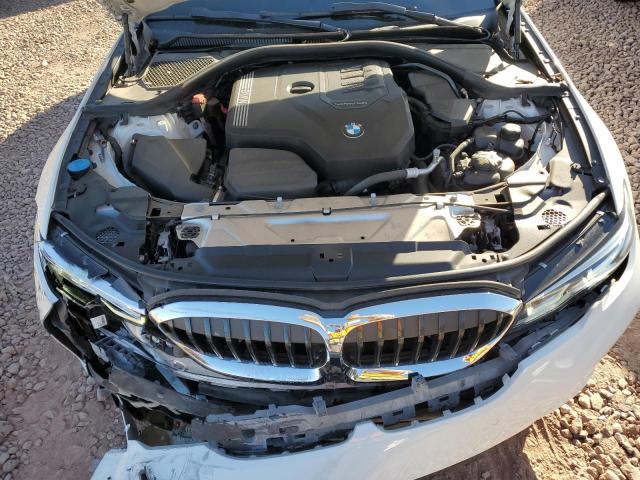 Photo 11 from auction – 2019 BMW 330I with VIN WBA5R1C52KAK07945