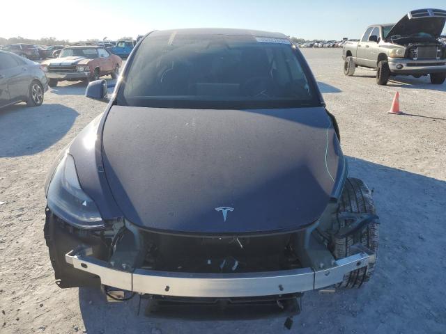 Photo 5 from auction – 2023 TESLA MODEL Y with VIN 7SAYGDEE2PF888520