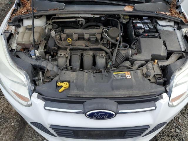 Photo 11 from auction – 2014 FORD FOCUS S with VIN 1FADP3E27EL159053