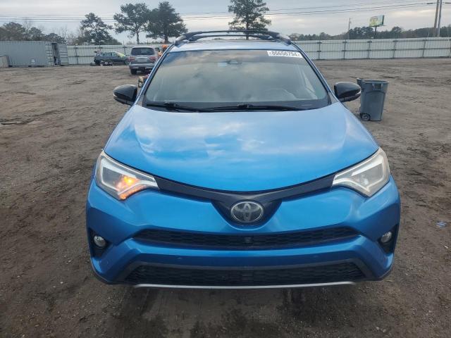 Photo 5 from auction – 2017 TOYOTA RAV4 SE with VIN JTMNFREV9HJ715331