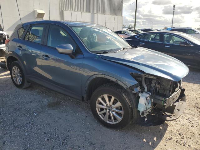 Photo 4 from auction – 2015 MAZDA CX-5 SPORT with VIN JM3KE2BE8F0459999