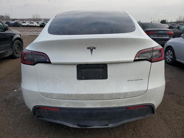Photo 6 from auction – 2022 TESLA MODEL Y with VIN 7SAYGDEE7NF450895