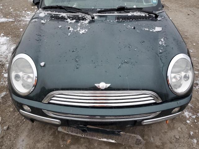 Photo 11 from auction – 2003 MINI COOPER with VIN WMWRC33423TC38840