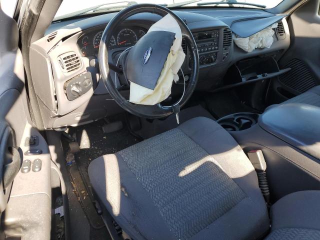 Photo 8 from auction – 2003 FORD F150 with VIN 1FTRX07W03KB17955