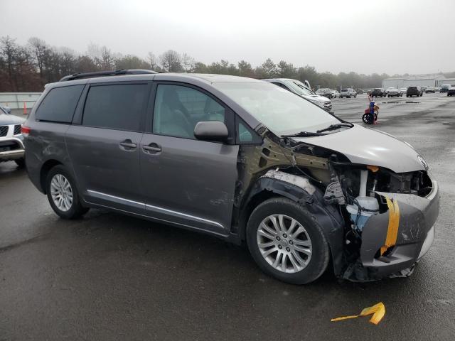 Photo 4 from auction – 2014 TOYOTA SIENNA XLE with VIN 5TDYK3DC9ES424834