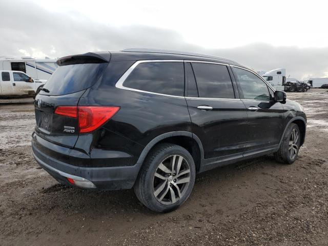 Photo 3 from auction – 2017 HONDA PILOT TOUR with VIN 5FNYF6H98HB042517