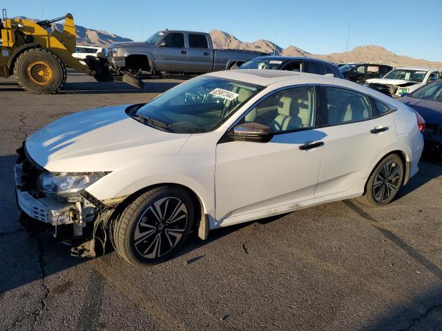 HONDA CIVIC EX 2017 with VIN 19XFC1F32HE009214 - Photo from auction